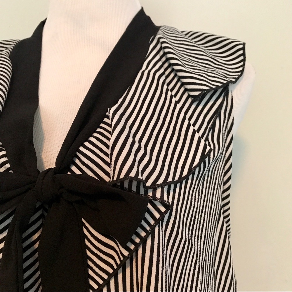 Sleeveless black white textured striped bow tank